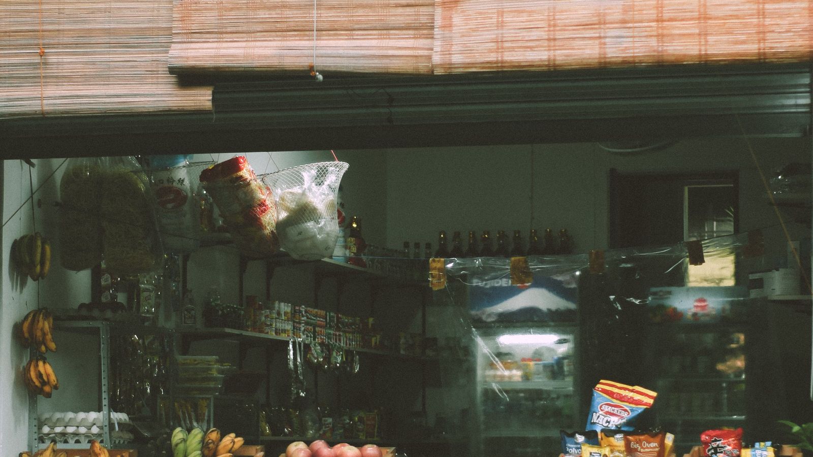 A small neighborhood shop counter stocked with goods in Imus, Philippines